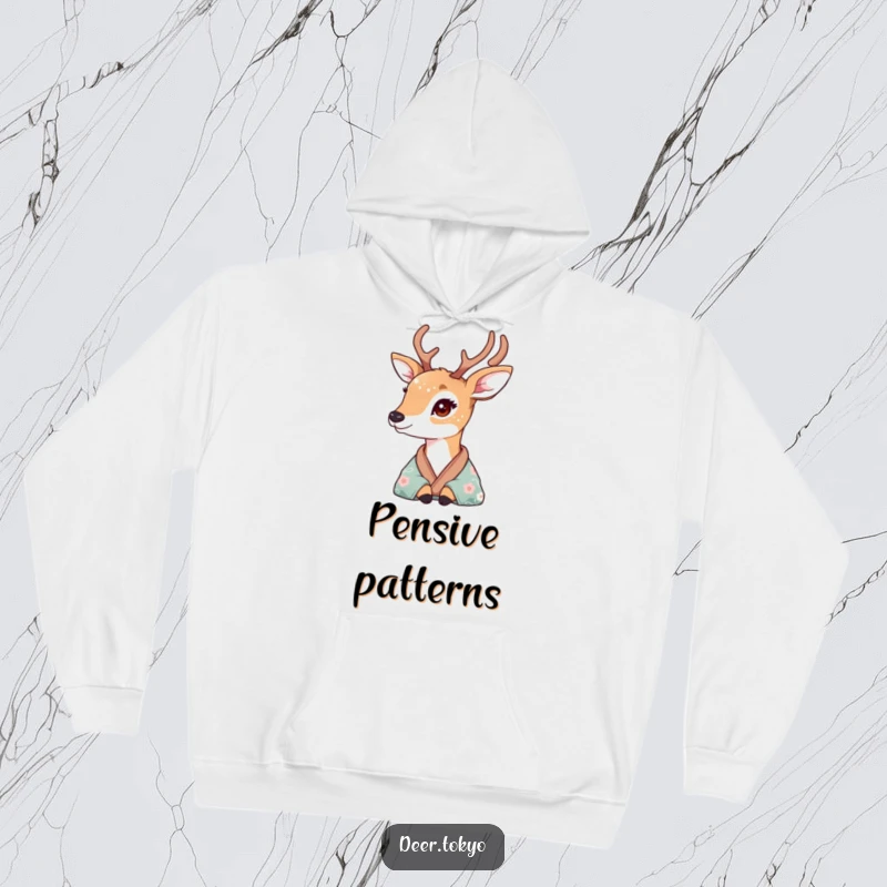 A deer with delicate floral fur patterns looking wistfully from a silk kimono, depicted on a warm and cozy hoodie.