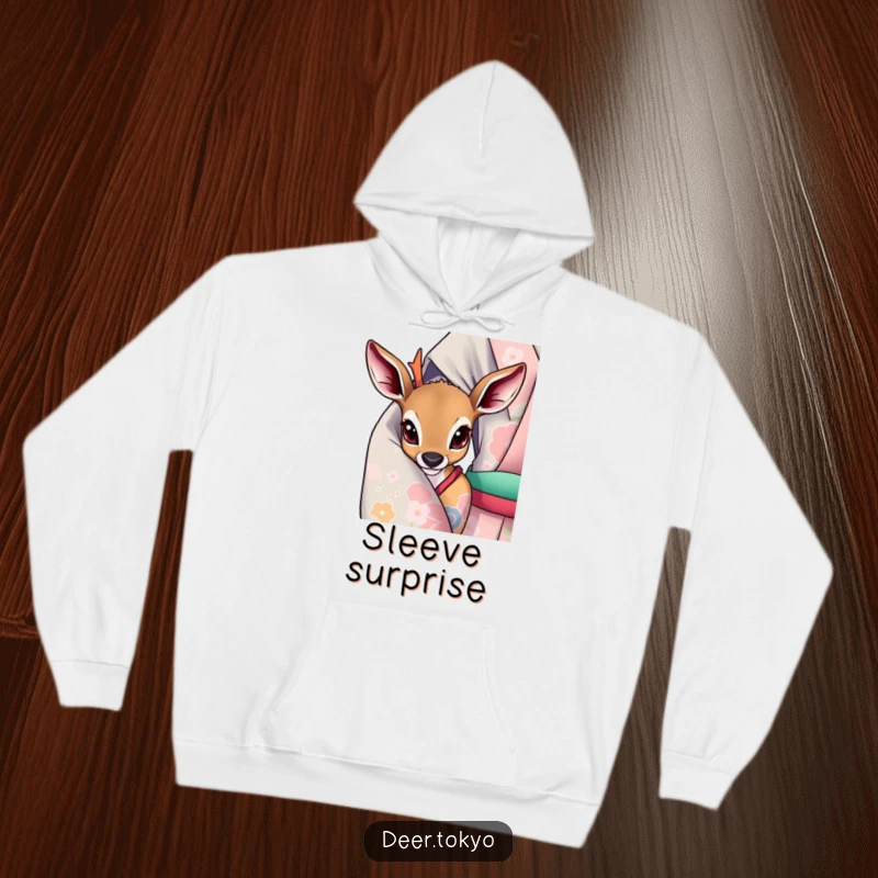 A curious deer peeking from a vibrant kimono sleeve, depicted on a warm and cozy hoodie.