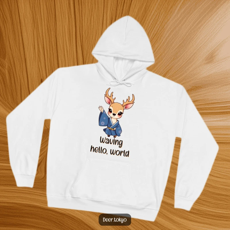Funny hoodie featuring a charming deer in a deep blue kimono, delicately waving a sleeve, offering warmth and elegant graphic appeal.