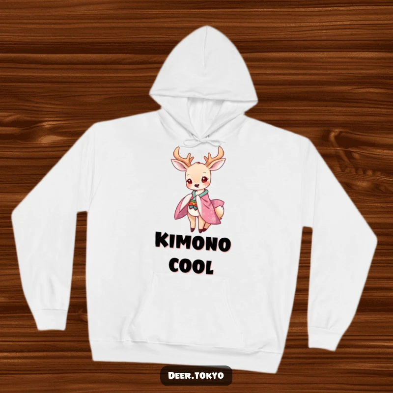 Funny hoodie featuring a graceful deer in a vibrant kimono bowing playfully, offering cozy comfort and elegant humor.