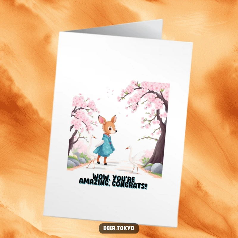 Elegant free printable congratulations card depicting a deer in a blue kimono with cranes strolling along a cherry blossom path.